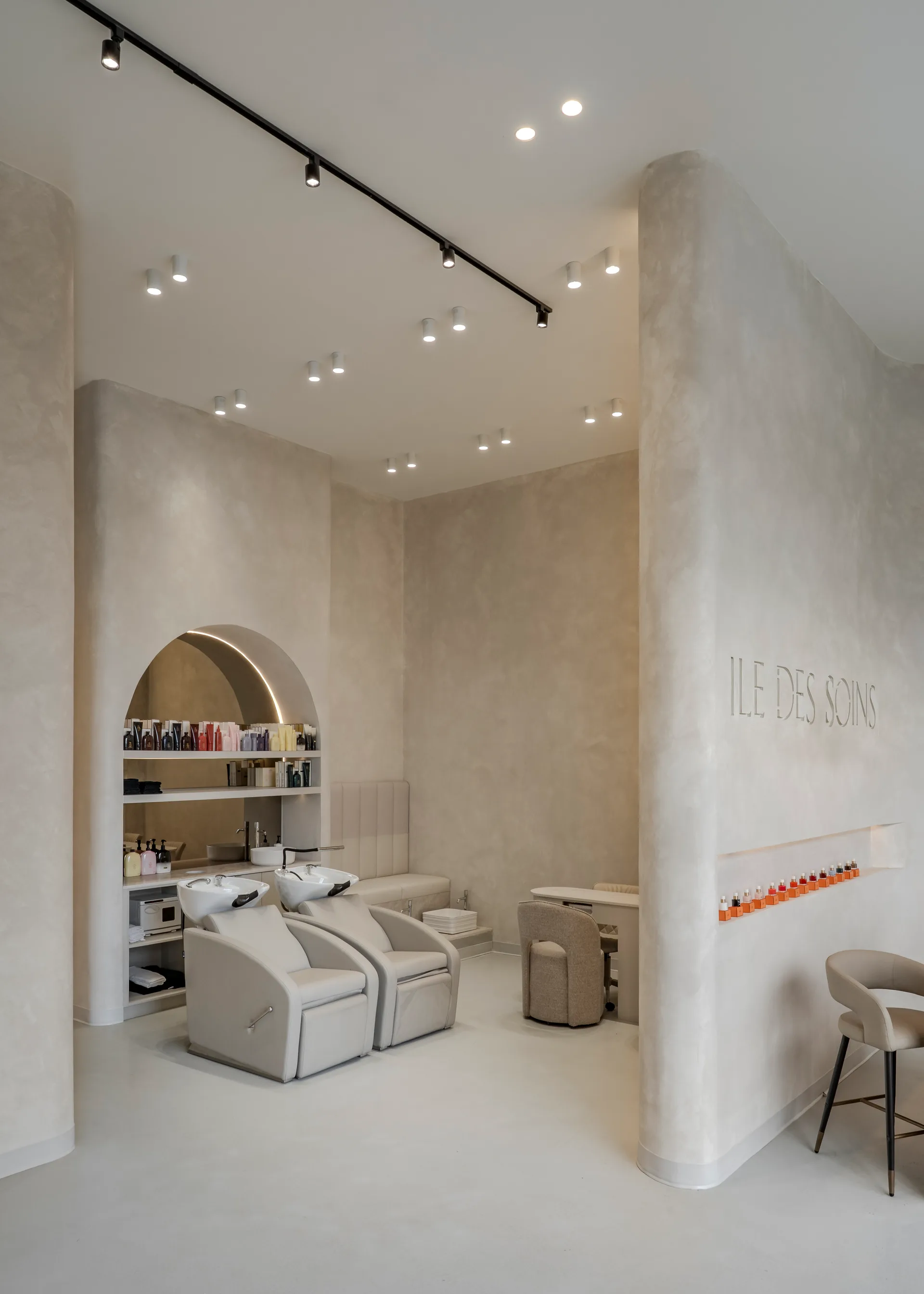 View through the salon toward product shelving