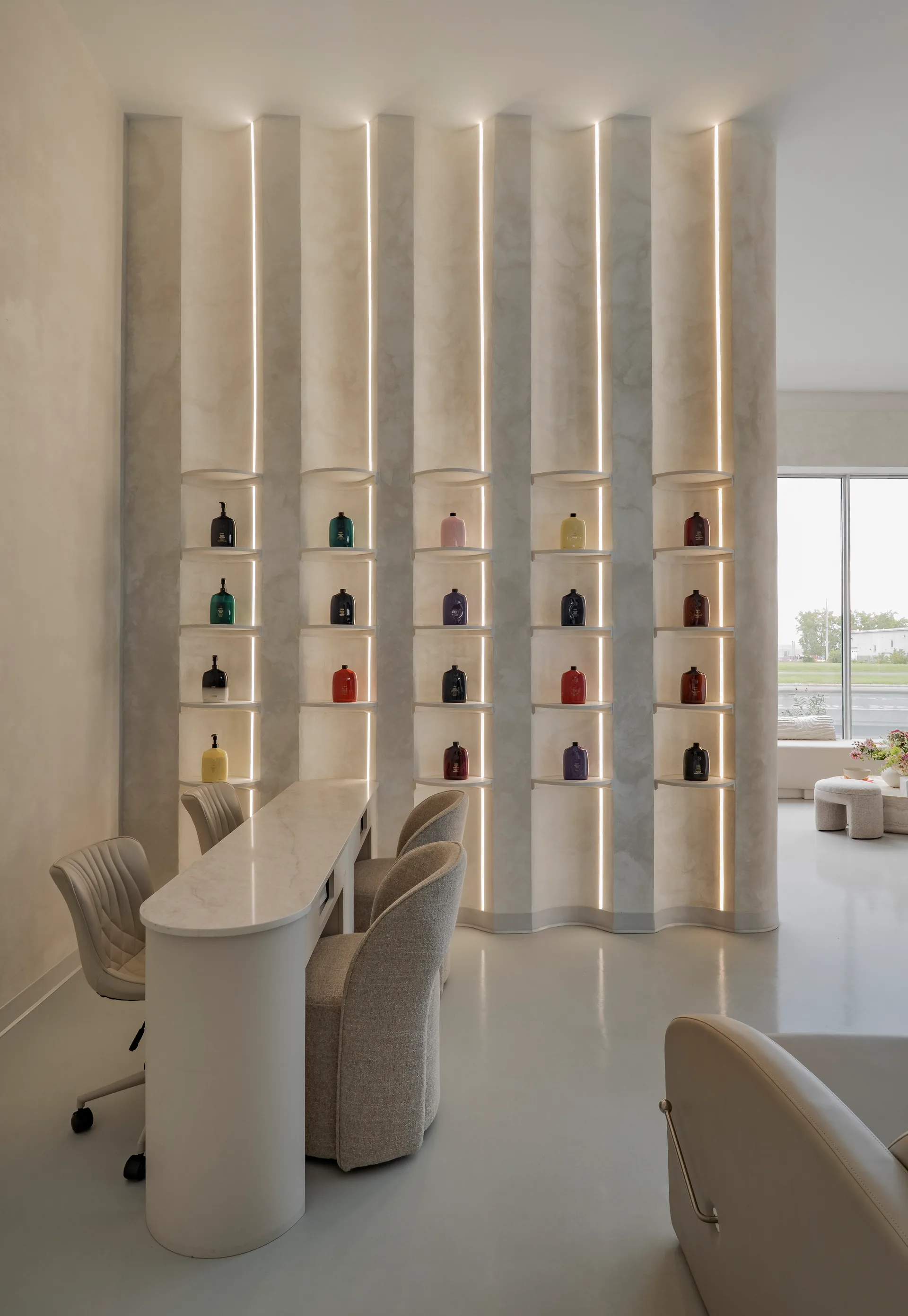 Curved consultation area and illuminated shelves